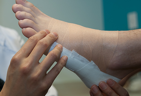 Low dye tape can provide temporary support to the heel and foot.